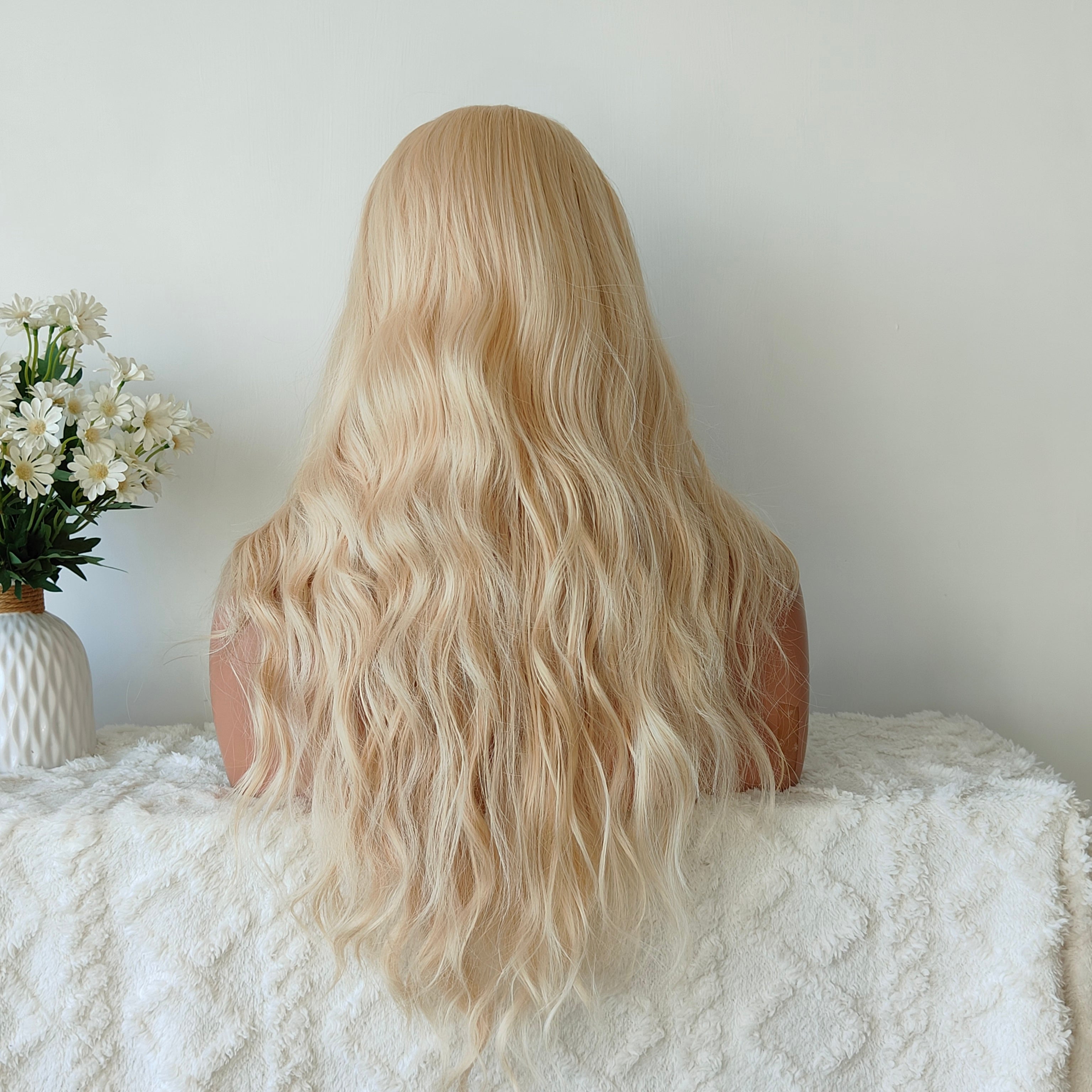 Ellie White blonde long wave wig without bangs